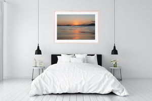 SUNSET OVER THE OCEAN