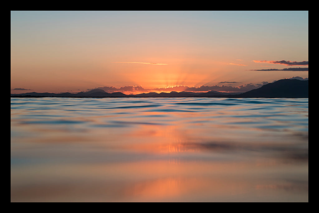 SUNSET OVER THE OCEAN