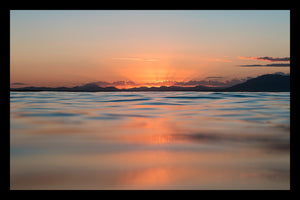 SUNSET OVER THE OCEAN